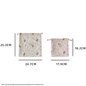 Size chart showing large and small floral bear drawstring bags in two dimensions