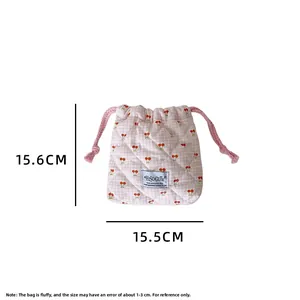 Pink checkered cherry pouch detail showing dimensions of 15.5cm width and 15.6cm height