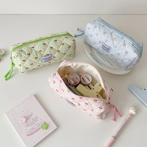 Quilted cherry checkered stationery pouch in pink, blue, and green colors for storage