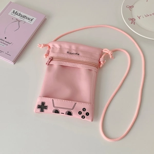 Pink drawstring crossbody bag with gaming controller pattern and long shoulder strap
