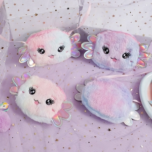 Macro detail of colorful plush cartoon bags with embroidery and laser wings on star tulle