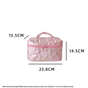 Pink star quilted cosmetic bag detail with satin finish and double metal zippers