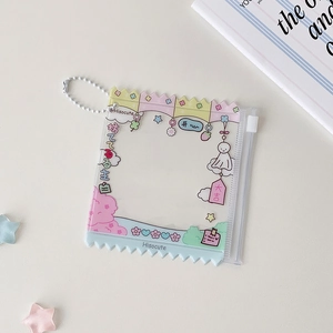 Close-up of pink PVC anime candy bag photocard holder with cute cloud and star illustrations