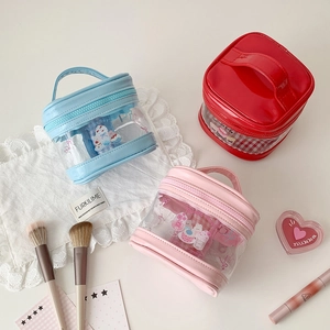 Three-piece cute cartoon PVC waterproof makeup bags with colorful PU trim and handles