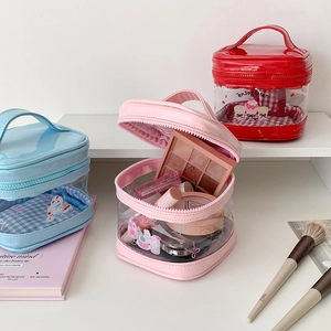 Cartoon transparent PVC makeup bag with PU leather trim and colorful handle