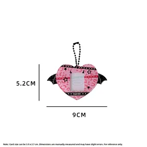 Pink leopard print heart card holder with bat wings and bead chain for photo display