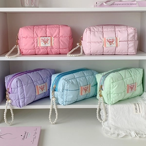 Quilted macaron color stationery pouches with pearl pendants in five pastel shades