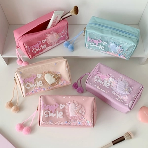 Pastel heart cosmetic bags with glitter sequins and fluffy pompom charms in five colors