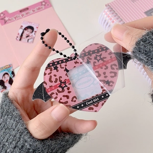 Pink leopard print acrylic heart photo holder with bat wings and black ball chain