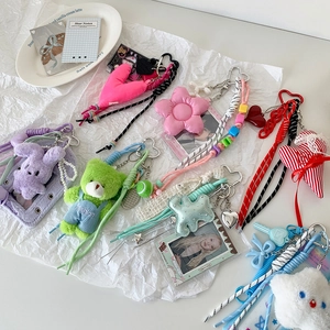 Collection of macaron-colored plush doll card holders with cute animal and flower charms