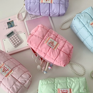 Quilted pastel pouch with pearl chain handle and cherry tag for stationery or makeup