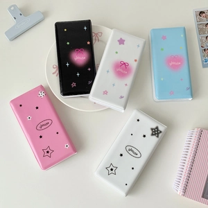 Vue détaillée de cinq mini classeurs de rangement pour cartes avec motifs d'étoiles
