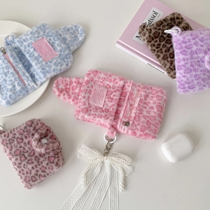 Variety of plush leopard print coin purses with zipper and pearl bow charm detail