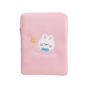 Pink corduroy 11-inch iPad sleeve featuring embroidered rabbit, star, and 'GOOD Day' text