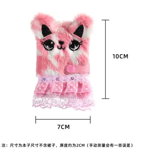 Detail view of pink plush cat notebook with lace skirt showing 10x7x2cm dimensions