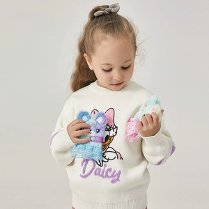 Detail of white knit sweater featuring a cute Daisy Duck cartoon print for girls