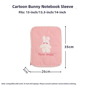 Pink quilted laptop sleeve with bunny embroidery and 35x26x2cm size dimensions