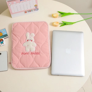 Pink quilted laptop sleeve with cute rabbit embroidery and Pink Rabbit logo for 14 inch PC