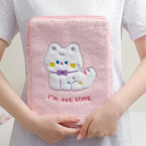 Detail of pink plush tablet sleeve featuring cute cat embroidery and soft texture
