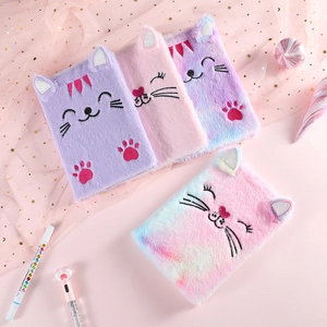 Detail of plush cat diary set with 3D ears and colorful embroidery on soft fabric