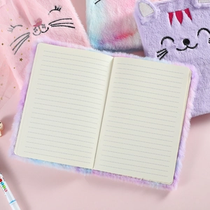 Large plush cartoon cat notebook with colorful gradient covers and lined paper inside