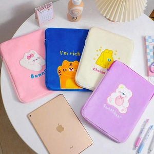 Detail of four colorful plush 11 inch iPad sleeves with cute cartoon animal embroidery