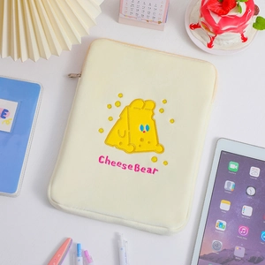 Detail of the CheeseBear embroidery and plush texture on the tablet protective sleeve