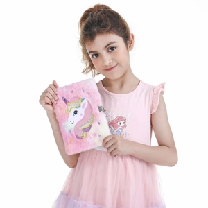 Pink plush unicorn A5 diary with heart-shaped metal lock held by a young girl
