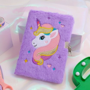 Detail of purple plush unicorn A5 diary with soft faux fur texture and silver metal lock