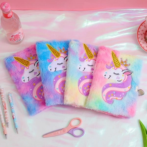 Detailed close-up of fluffy unicorn journal with heart lock and colorful faux fur texture