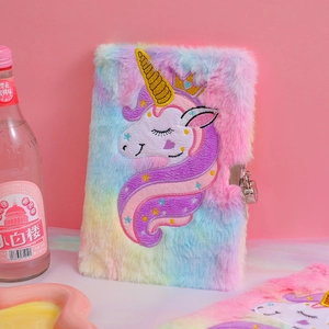 Detailed view of rainbow plush unicorn diary featuring soft faux fur and metal lock