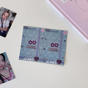 Close-up of denim texture photo card holder with retro star patterns and Y2K aesthetic