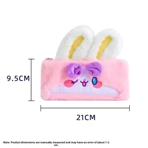 Pink plush bunny pencil case detail showing 21cm length dimensions and cute rabbit ears