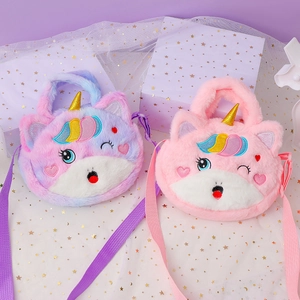 Plush unicorn crossbody bags for girls in pink and purple colors on a gift box