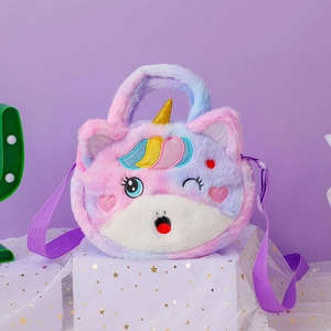 Macro shot of fluffy unicorn cat plush bag with glitter horn and embroidery detail