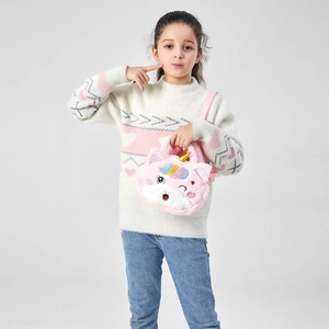 Detail of pink plush unicorn crossbody bag with golden horn and colorful embroidery