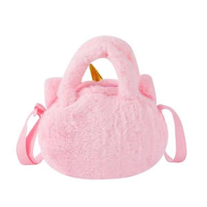 Detailed view of pink plush unicorn bag with golden horn and adjustable shoulder strap