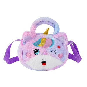 Close-up of embroidered unicorn plush bag with sequined horn and gradient faux fur details