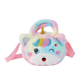 Macro detail of plush unicorn bag showing rainbow fur texture and fine embroidery