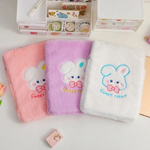 Detailed plush laptop sleeves in pink, purple, and white with cute rabbit embroidery