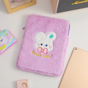 Detail of purple plush iPad sleeve with cute rabbit embroidery and sweet rabbit text