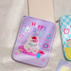 Macro shot of purple PU leather tablet sleeve featuring cute cartoon bear and zip detail