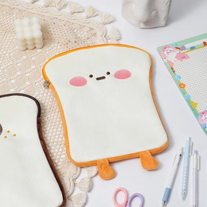 Close-up of cute toast plush iPad case with soft cream fabric and orange embroidered detail