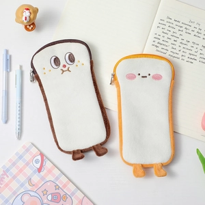 Detail of plush toast pencil cases featuring cute cartoon embroidery and soft 3D legs