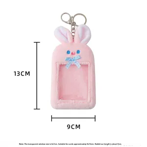Pink plush rabbit card holder with dimensions showing 13x9cm size and metal keychain