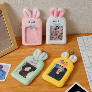 Cute plush bunny card holders in pink, white, mint, and yellow for idol photo cards
