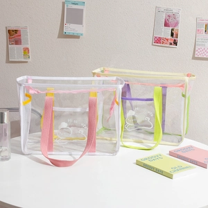 Detail of transparent PVC jelly bags with cartoon patterns and colorful zipper handles