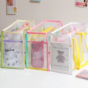 Transparent PVC mesh tote bag with colorful zipper and handles for beach and bath use