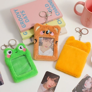 Plush animal photo card holders with frog, koala, and cat designs on colorful background