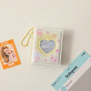 Detail of 2-inch mini photo album with heart cutout and cute bear design